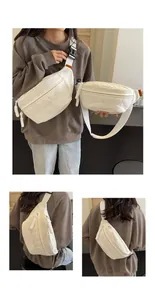 Detailed close-up views of a stylish white canvas crossbody chest bag for women