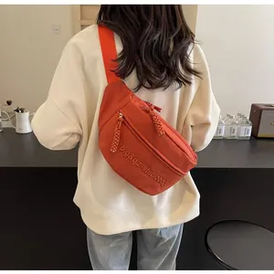 Stylish orange sports sling chest bag for unisex outdoor activities and cycling