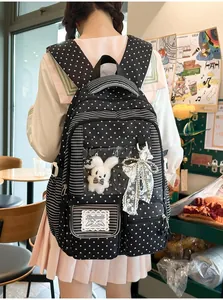 Japanese style black backpack with star pattern and cute plush bunny detail view