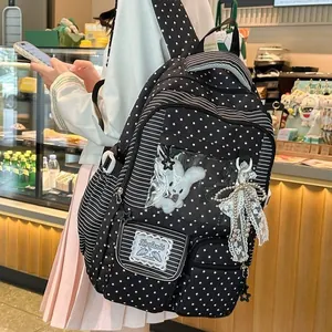 Japanese style star pattern backpack featuring transparent pocket and plush bunny