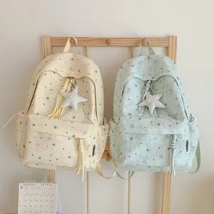 Korean style star pattern backpacks in yellow and green with cute plush star pendants