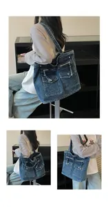 Casual large capacity blue denim tote bag featuring functional front pockets and zippers