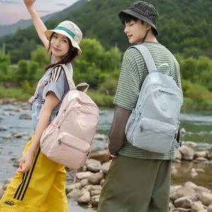 Stylish lightweight outdoor backpacks for women in pink and light blue colors.