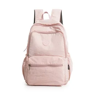 Fashionable pink lightweight casual backpack for women with multi-compartment design for travel