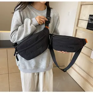 Stylish black waterproof sports chest bag and versatile waist pack for cycling and hiking
