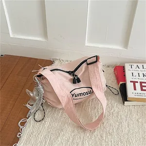 Stylish pink lightweight crossbody bag with minimalist wrinkled nylon fabric design