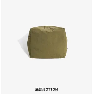 Bottom detail of the minimalist olive green large capacity nylon tote bag