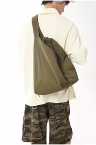 Detailed back view of a minimalist large capacity army green nylon crossbody gym bag