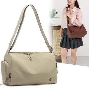 Versatile khaki gym bag with crossbody strap and dry-wet separation for travel and yoga