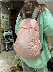 Close-up detail view of a lightweight pink sports backpack for travel and commuting