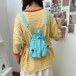Lichtblauwe waterdichte nylon rugzak met trekkoord voor dames voor vrijetijdsreizen