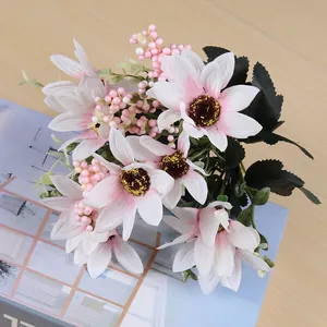 Close-up of artificial daisy bouquet with pink and white petals for home decor