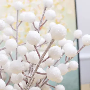 Macro view of flocked white foam berries with crystalline snowflake texture