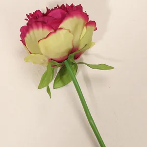 Side view of artificial peony flower with realistic pink and yellow petals for home decor