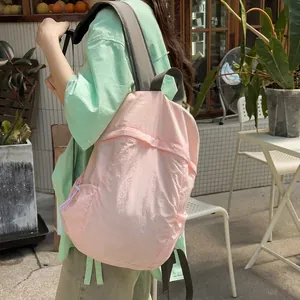 Minimalist lightweight pink backpack for women students travel and commuting