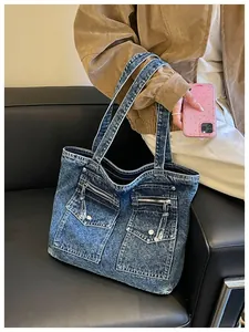 Stylish large capacity denim tote bag with functional front zipper pockets for women