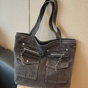 Stylish large capacity black denim tote bag with functional front zipper pockets
