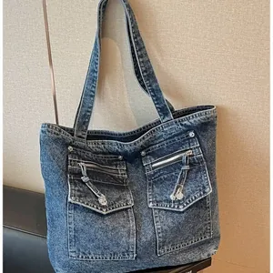 Large capacity washed denim tote bag featuring functional front zipper pockets for women
