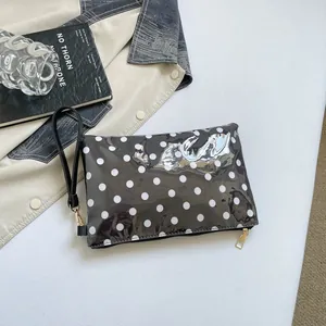 Large capacity black and white polka dot cosmetic bag with wristlet strap