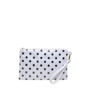 Large capacity white polka dot cosmetic bag for travel and skincare organization