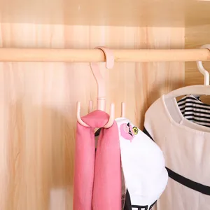 Rotatable 4-claw hanger for wardrobe storage of scarves and hats