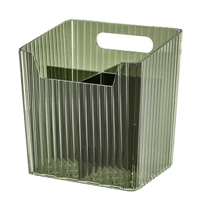 Translucent green ribbed acrylic bathroom organizer with handle and four compartments