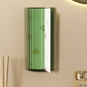 Wall-mounted dark green fluted tissue box for disposable wipes in modern bathroom