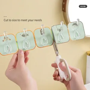 Strong self-adhesive row hooks for wall mounting, trimmable design for bathroom use.