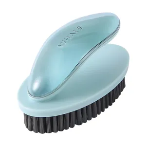 Ergonomic laundry brush with soft bristles for efficient cleaning of clothes and shoes
