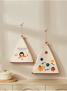 Detailed view of two foldable insulated food covers featuring cute cartoon character prints