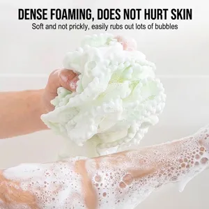 Fleur de douche extra douce en maille pour une mousse dense en salle de bain