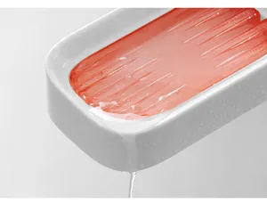 Close-up of modern dual-layer soap dish showing efficient water drainage system