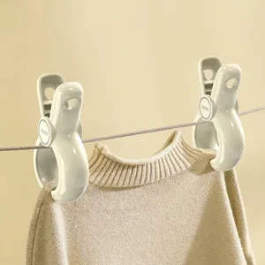 Large windproof non-marking laundry clips for quilts and bedsheets on a drying line