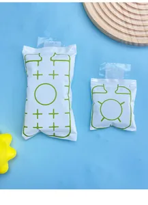 Detailed view of two different sizes of white reusable instant cold ice packs for relief