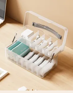 Detailed view of tiered data cable storage box with multiple dividers for organization