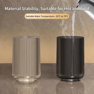 Elegant ribbed PET mouthwash cups in amber and grey finish, heat resistant up to 70C
