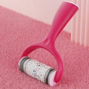 Pink handheld lint roller with tear-off adhesive sheets for clothes and carpet