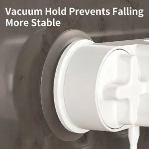 Punch-free mop holder with strong suction cup for wall-mounted bathroom storage.