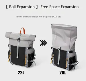 Detail view of the roll-top expansion feature, changing capacity from 22L to 28L.