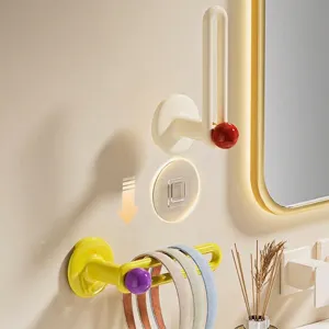 Minimalist wall-mounted headband storage hooks for bathroom hair accessory organization