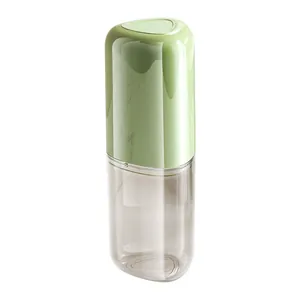 Portable travel toothbrush cup with light green and semi-transparent grey design