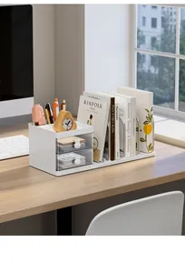 Minimalist white desktop organizer with drawers and book rack on a wooden office desk