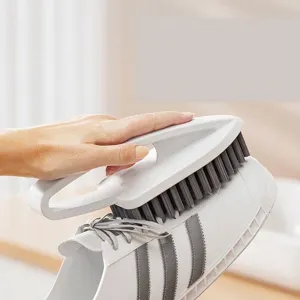 Multifunctional shoe brush with ergonomic handle and stiff bristles for deep cleaning