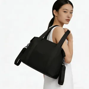 Large capacity black nylon tote bag for women, versatile shoulder crossbody style.