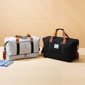Large capacity travel duffel bag gym sports shoulder bag with adjustable shoulder strap.