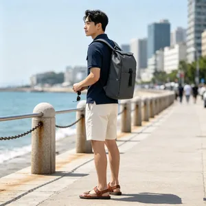 Stylish grey large capacity backpack for men and women, outdoor lifestyle view
