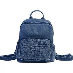 Sac à dos en denim délavé bleu pour femme avec une poche avant matelassée élégante