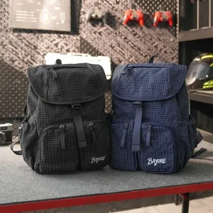 Stylish Korean style grid nylon backpacks in black and navy for urban commuting.