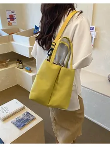 Fashionable yellow crossbody cup carrier bag with double slots for daily commute