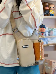 Multi-functional outdoor crossbody bag with water bottle pouch and khaki orange color block